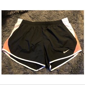 Black and pink Nike shorts